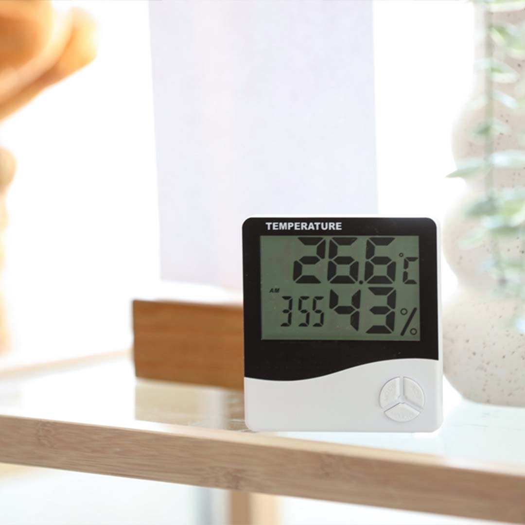 Digital hygrometer showing indoor humidity